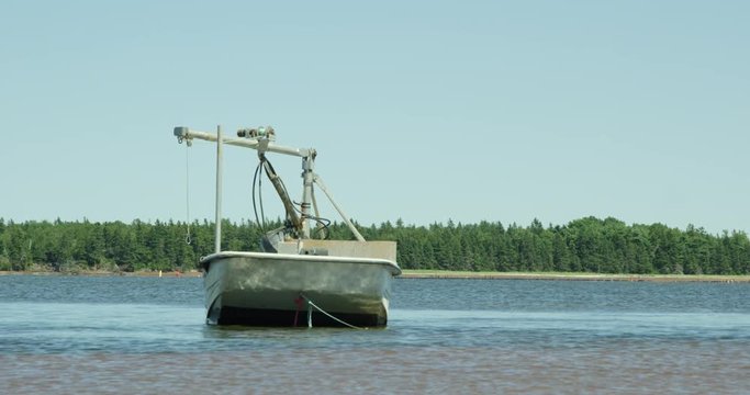  mussels and oyster boat crane on water - isolated  and empty