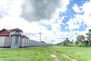 Fototapeta premium Prison wall barriers dark side with a dirty black background wallpaper.