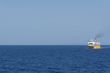 view of an yellow ferry at the calm blue sea