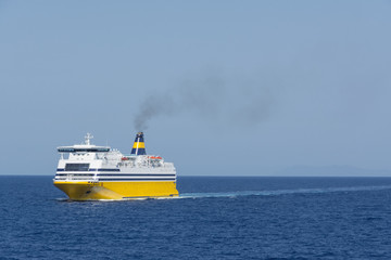 view of an yellow ferry at the calm blue sea