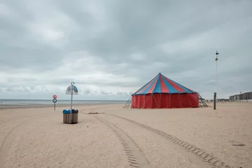 Deurstickers Circus tent on the beach of De Panne in Belgium. © Erik_AJV