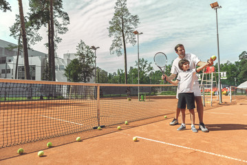 Interested family learning to play game
