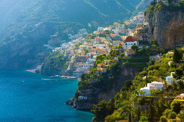 Morning view of Positano cityscape on coast line of mediterranean sea, Italy