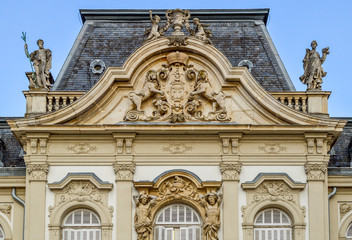 Fototapeta na wymiar Closeup photo of the facade of rich baroque 
