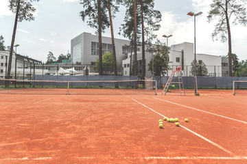 Lot of little yellow spheres on court