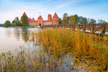 Naklejka premium Old castle in sunrise time. Trakai, Lithuania, Eastern Europe.