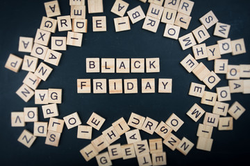 The letters on the black background form the text "black friday"