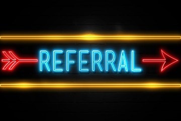 Referral  - fluorescent Neon Sign on brickwall Front view