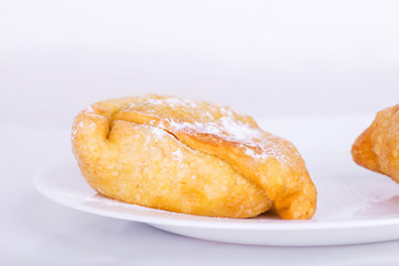 sweet samosa on a white plate