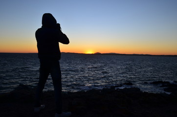 The photographer shooting the sunset