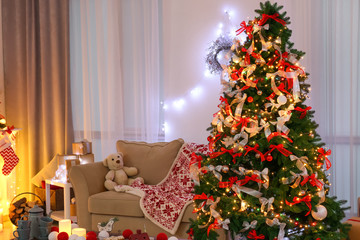 Decorated living room with beautiful Christmas tree