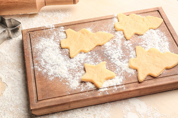 Christmas raw cookies on table