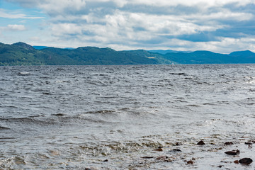 panorama of the Scottish Highlands in England on the shores of Loch Ness lake