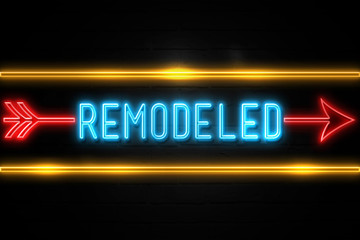 Remodeled  - fluorescent Neon Sign on brickwall Front view