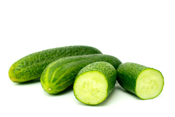 Ripe cucumber on white