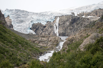 Fototapeta na wymiar Blue ice glacier front. Buer glacier, Norway