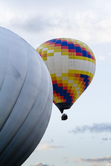 Obraz premium Two hot air balloons up in the sky
