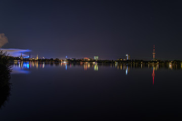 nightly panorama of Hamburg - Inner City with laser beam