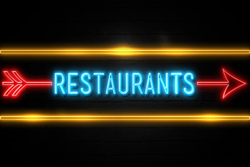 Restaurants  - fluorescent Neon Sign on brickwall Front view