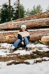 Lifestyle picture of a young woman in winter