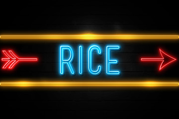Obraz premium Rice - fluorescent Neon Sign on brickwall Front view