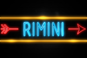 Rimini  - fluorescent Neon Sign on brickwall Front view