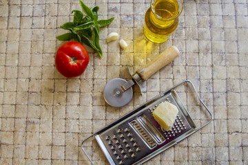 Pizza ingredients and cutter