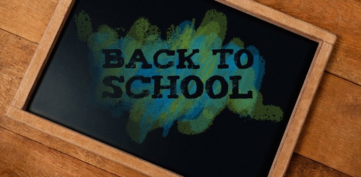 Composite image of back to school text on green and blue splash