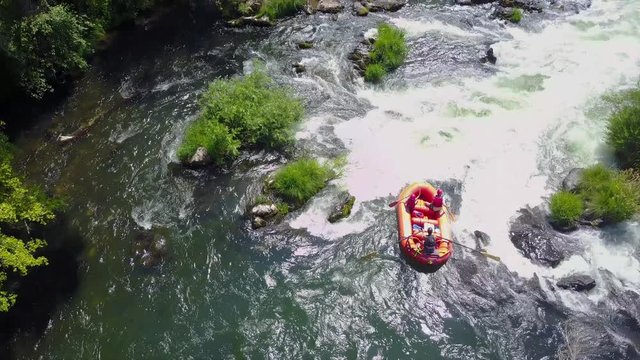 Overhead Aerial Shot of Rafting Boat on Raging River with Rapids 4K