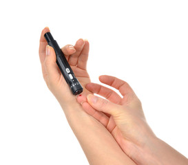 Diabetes lancet in hand prick finger to make punctures to obtain small blood specimens