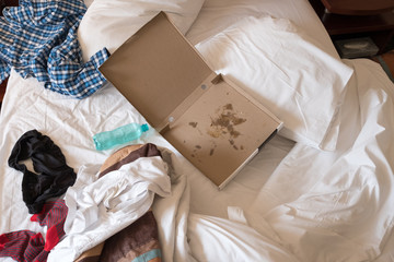 messy hotel room after being trashed