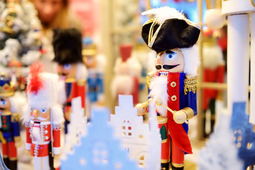 Christmas nutcracker sold at Christmas market in Vilnius, Lithuania. Decorated shopping stands with...