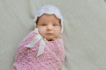 indoor portrait of adorable european newborn baby