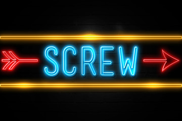 Obraz premium Screw - fluorescent Neon Sign on brickwall Front view