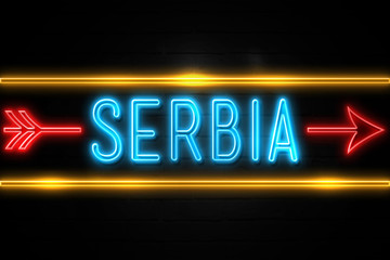 Naklejka na ściany i meble Serbia - fluorescent Neon Sign on brickwall Front view