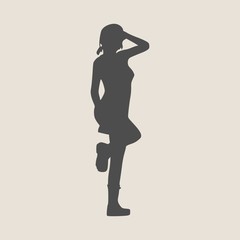 Fototapeta premium Woman in Short Dress or Skirt. Black Silhouette Standing Full Length Over White Background. Vector Illustration. Half Turn View