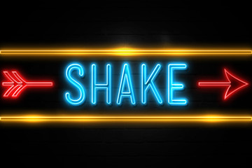 Shake  - fluorescent Neon Sign on brickwall Front view