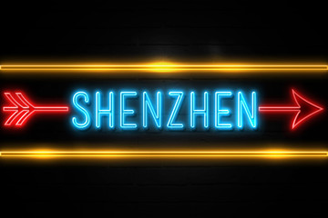 Shenzhen  - fluorescent Neon Sign on brickwall Front view