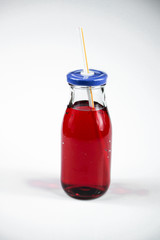 Fruit and vegetable juice bottles isolated on white background