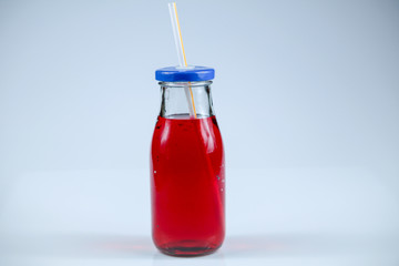 Fruit and vegetable juice bottles isolated on white background