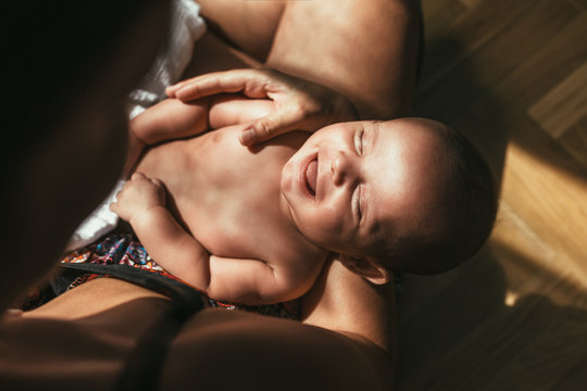 Baby in his mother's arms