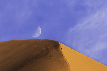 walking to the the moon on the sand dune of Namibia