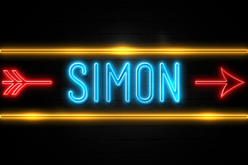 Simon  - fluorescent Neon Sign on brickwall Front view