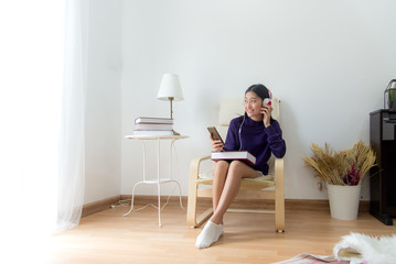 Inspired young asian woman listening the music at home, relax and happy life. Lifestyle Concept.