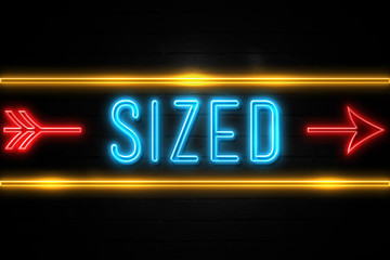 Sized  - fluorescent Neon Sign on brickwall Front view