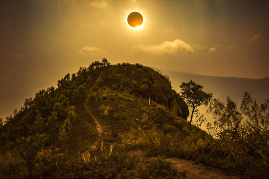 Scientific natural phenomenon. Total solar eclipse glowing on sky.