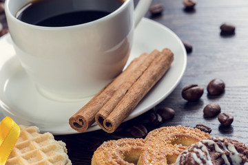 Biscuits and coffee on table