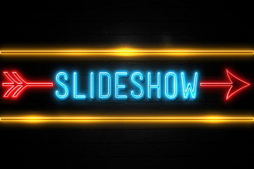 Slideshow  - fluorescent Neon Sign on brickwall Front view