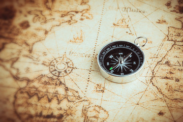 Plakat Compass on old map vintage style