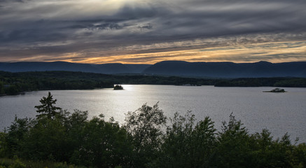 Fototapeta na wymiar Sunset Island Lake Silhouette